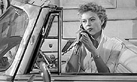 Wow, un téléphone mobile dans sa voiture... en 1957!!!