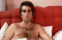 Danny Bassett [Alex Rocco] dans un moment de relaxation.....  Au bordel local!